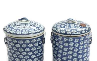 A pair of Chinese porcelain blue and white storage jars and covers,...