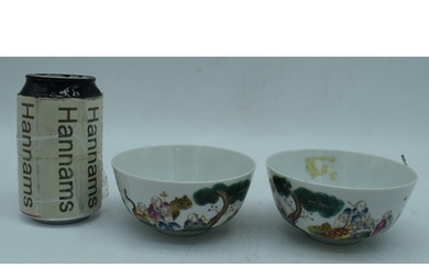 A pair of Chinese porcelain polychrome bowls decorated with ...