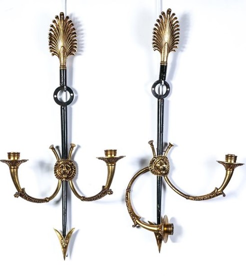 A pair of French Empire style patinated bronze...