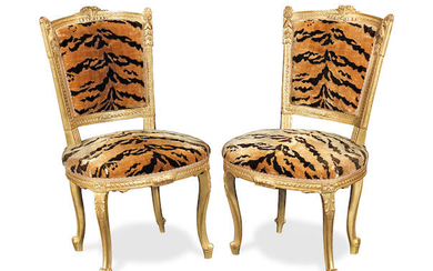 A pair of French carved giltwood side chairs