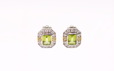A pair of Peridot and diamond 18ct white gold earrings,...