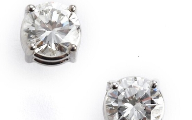SOLD. A pair of diamond ear studs each set with a brilliant-cut diamond weighing a total of app. 1.50 ct., mounted in 18k white gold. I/VS. (2) – Bruun Rasmussen Auctioneers of Fine Art