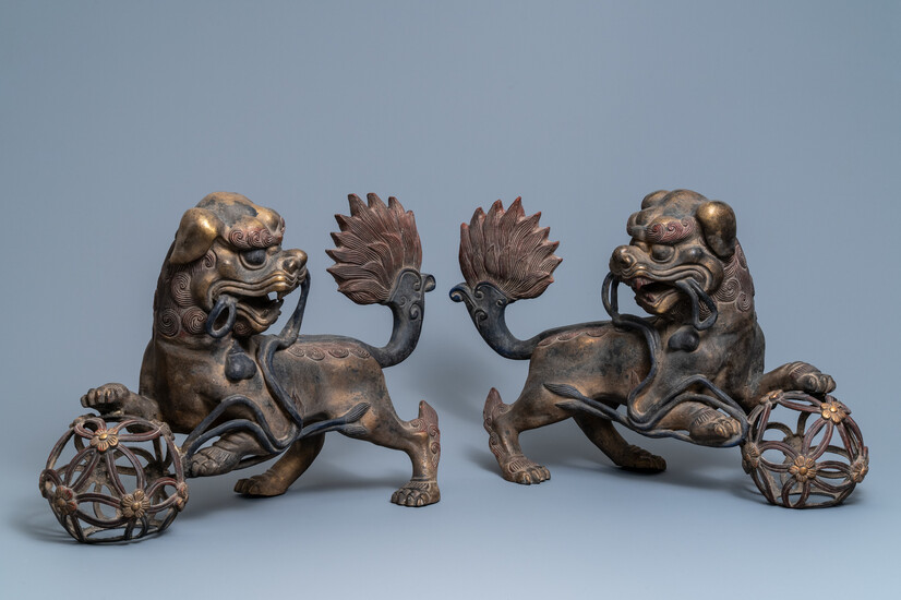 A pair of large Chinese gilt-lacquered bronze Buddhist lions, 19th C.