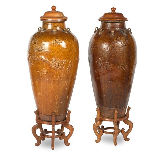 A pair of mataban-style earthenware vases with wood covers and stands