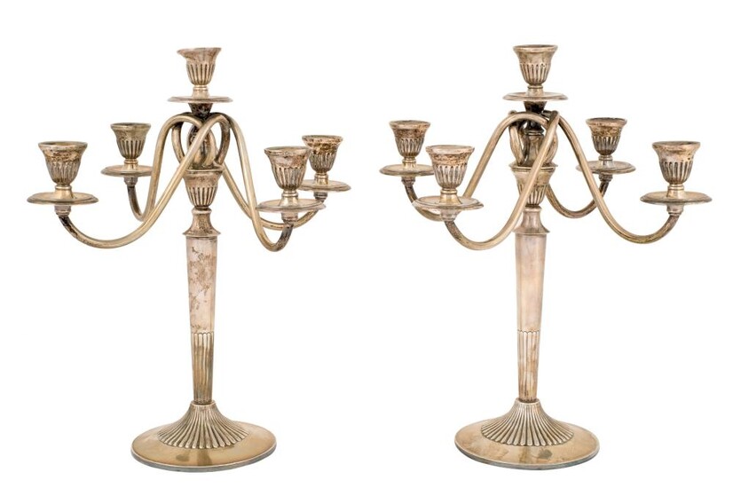 A pair of silver candelabra. Spain, 20th Century