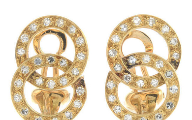 A pair of single-cut diamond earrings.