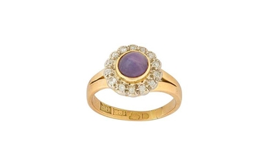 A purple star sapphire and diamond cluster ring, 1964