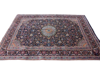 A rich blue ground Persian Kashan carpet, the Shabazz lozeng...