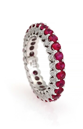 NOT SOLD. A ruby and diamond ring set with numerous rubies weighing a total of...