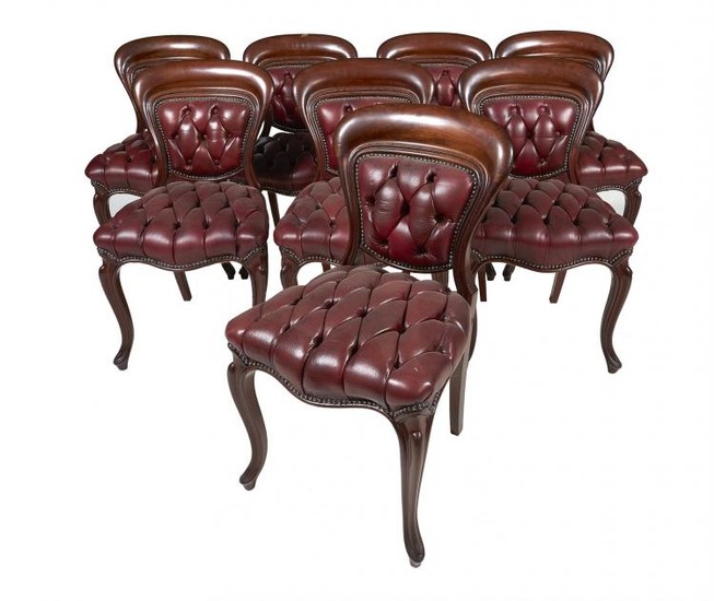 A set of eight Victorian mahogany and leather upholstered dining chairs
