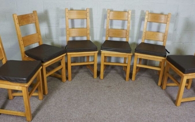 A set of six oak ladder back dining chairs, contemporary, of solid frame construction, with