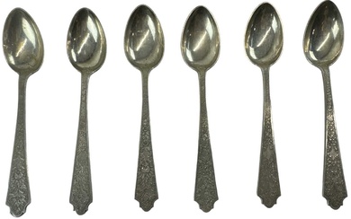A set of six white metal teaspoons, indistinct marks, combined...