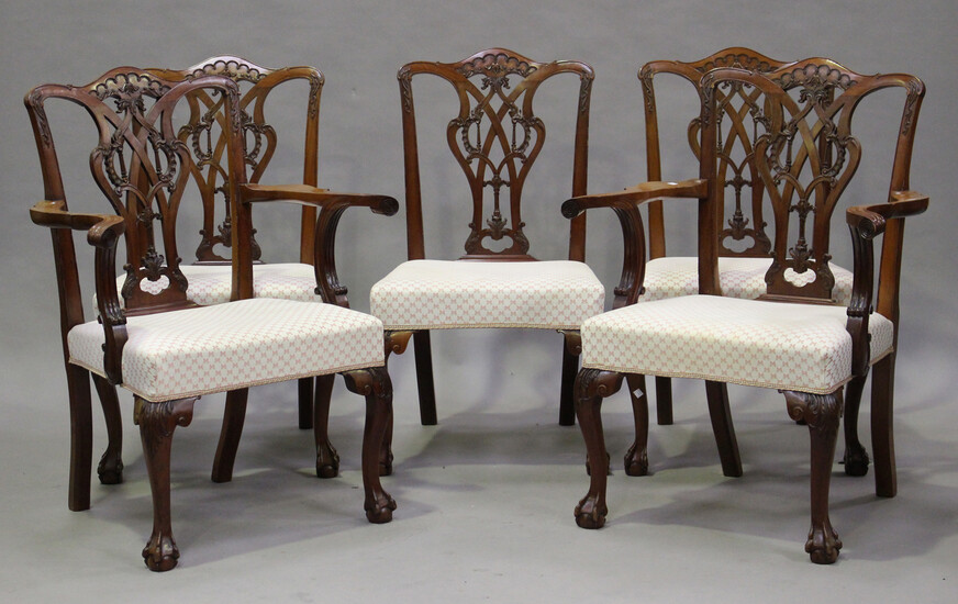 A set of ten 20th century George III style mahogany dining chairs, the finely carved pierced splat b