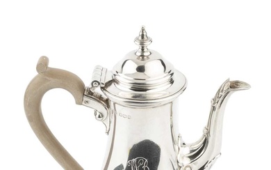 A silver bachelor's coffee pot, of baluster form, with hinged...
