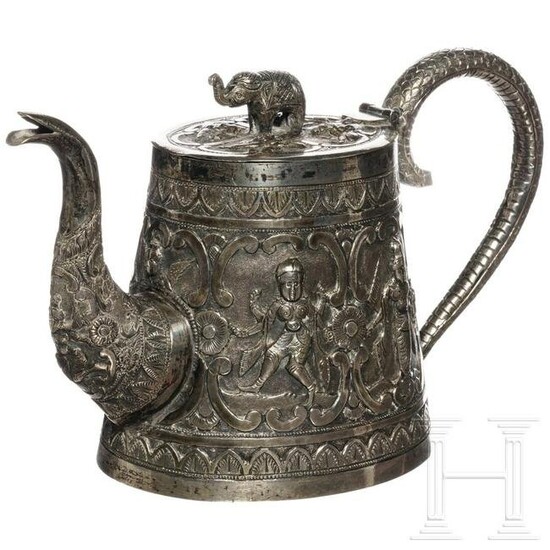 A silver tea pot, probably Burmese, circa 1900