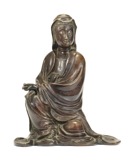 A silver-wire-inlaid bronze figure of Guanyin