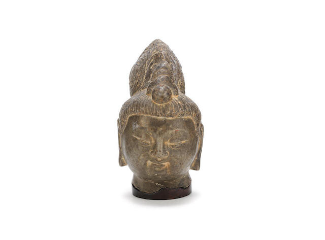 A stone head of a Bodhisattva