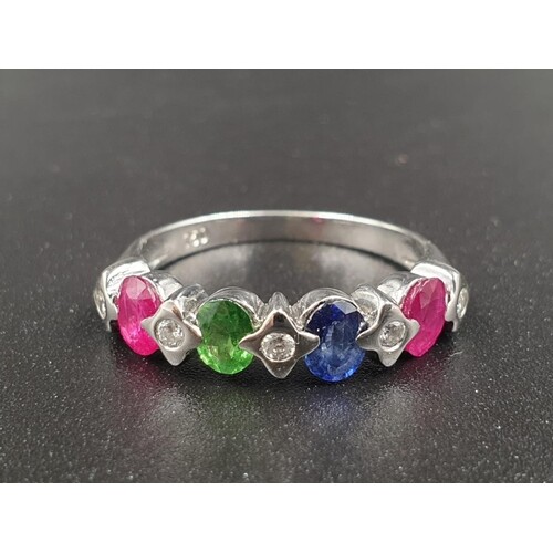 AN 18K WHITE GOLD RING WITH RUBY ,SAPPHIRE AND EMERALD STONE...