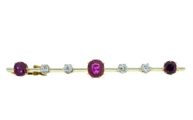 An 18ct gold early 20th century ruby and old-cut diamond bar brooch.
