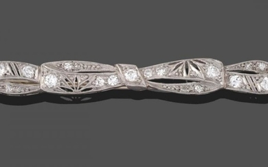 An Art Deco Diamond Bow Brooch, the bow form with...