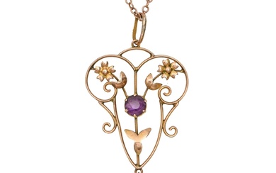 An Edwardian 9ct gold openwork and amethyst pendant, on late...