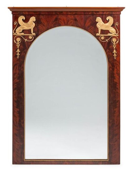 An Empire Style Gilt Metal Mounted Mahogany Mirror