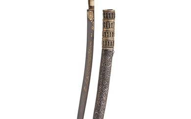 An Ottoman yatagan with Wootz-Damascus blade and silver scabbard, dated 1800