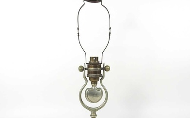 An early 20th century brass ship's oil lamp, with engraved...