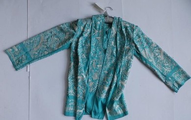 An early 20thC Chinese turquoise jacket with cream silk...