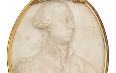 An oval carved marble portrait relief of a nobleman