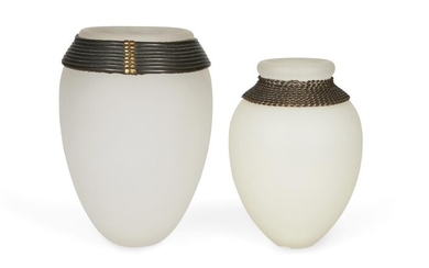 Anna Dickinson (b.1961), Two ovoid vases, 1987 & 1991, Frosted glass, patinated brass, signed and dated 'A Dickinson 1987' & 'A Dickinson 1991' respectively, larger: 13cm high, smaller: 10.5cm high, (ARR) (2)