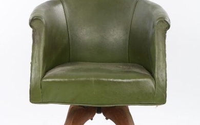 Author Lawrence Meynell's desk chair, the green leather swivel desk chair above four arched legs