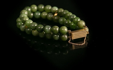 BRACELET WITH TWO ROWS OF JADE BEADS