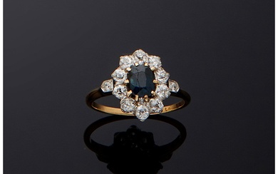 Bague "margueritte" en or jaune 18 carats (750/000), platine (950/000), diamants et saphir, formant une...