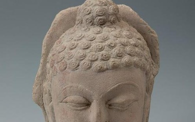 Buddha; India, 19th century. Carved stone. It presents damage caused by the passage of time.