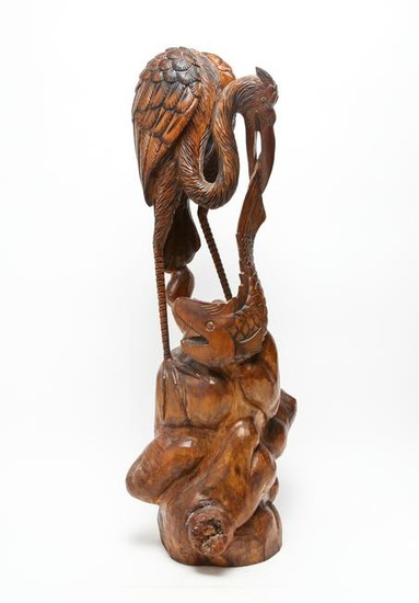 Carved Wood Sculpture of Crane With Fish