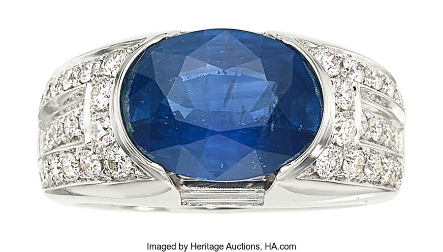 Ceylon Sapphire, Diamond, White Gold Ring The ring features...