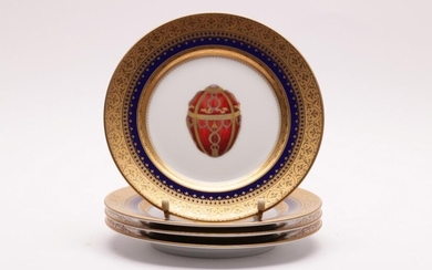 Collection of gilded rimmed dishes with fabrege egg form print in centre