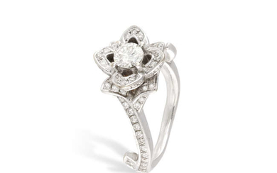 Description A DIAMOND DRESS RING, designed as a flower,...