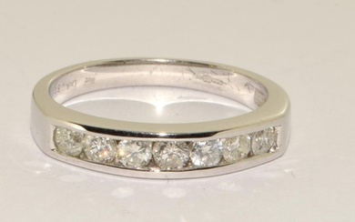 Diamond 0.50 point half eternity ring in 9ct white gold unwo...
