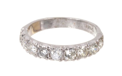 Diamond eternity ring with a band of nine old cut diamonds