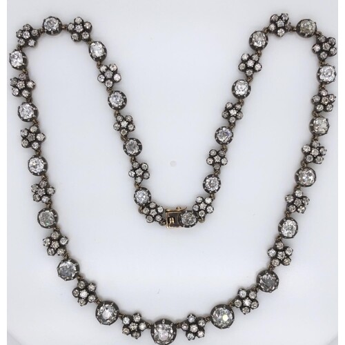 Diamond necklace, floral motif set with 24 petals set with o...