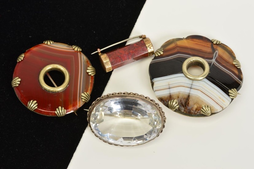 FOUR AGATE AND GEM BROOCHES, to include an oval rock crystal...