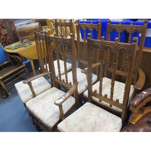 Four Ercol dining chairs and two matching carvers together w...