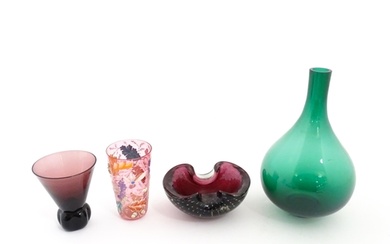 Four items of glassware to include a green bottle vase, an a...