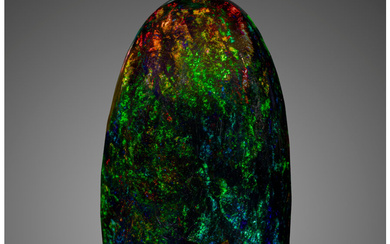 Gemstone: Opal - 32.30 Cts. Ethiopia This ample Opal...