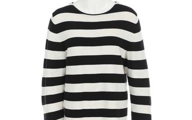 NOT SOLD. Gucci: A "Mare Gothicum" black and white striped sweater with long sleeves, a...
