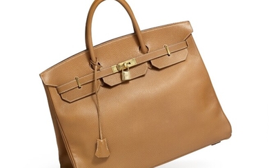 NOT SOLD. Hermès: A "Birkin" 40 bag of light brown Ardennes leather with golden hardware,...