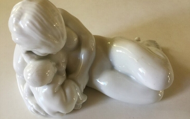 Kai Nielsen: Porcelain figurine in the shape of mother with child. Bing & Grøndahl. H. 12 cm. L. 20 cm.