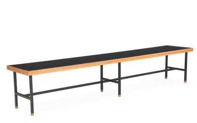 Kurt Østervig, attributed: Bench/side table with six-legged black lacquered metal frame. Black formica top with oak rim. H. 40,5 cm. L. 212 cm. W. 40 cm.